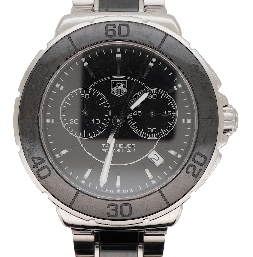 A gentleman's 2011 stainless steel TAG Heuer Formula One quartz chronograph wrist watch, on a stainless steel Tag Heuer bracelet